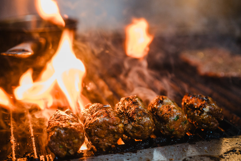 Sharing meze style food cooked over fire