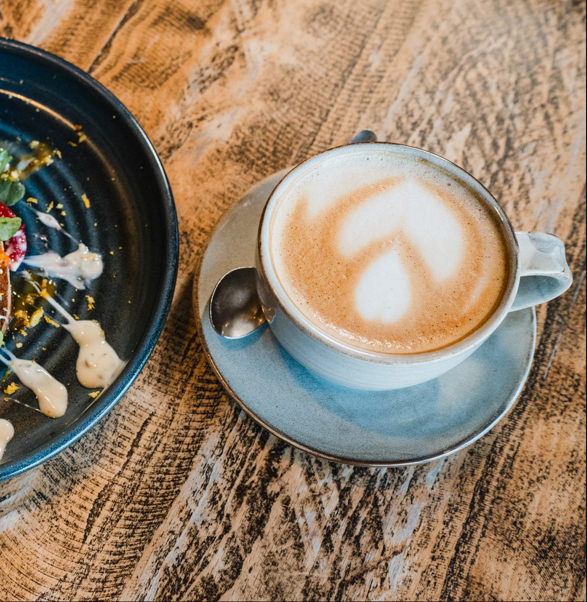 Fresh brunch dishes and a barista-style coffee at Gas Street Social, The Mailbox, Birmingham, showcasing relaxed daytime dining and coffee in the heart of the city.