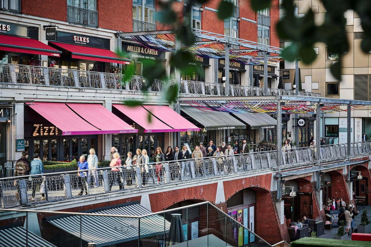Canalside view of The Mailbox in Birmingham city centre, showing the restaurants and waterfront setting near Gas Street Social.